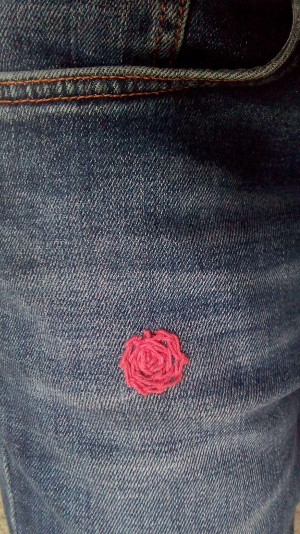 Rose on thigh